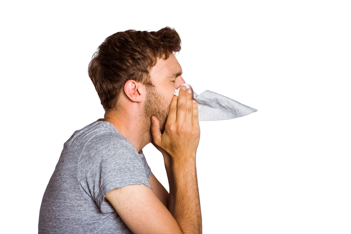 Man Blowing Nose