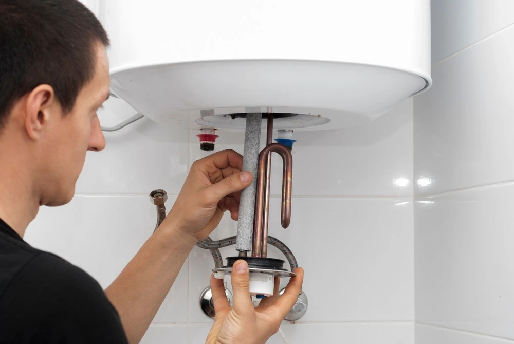 water heater master-installs-new-electric-heating-