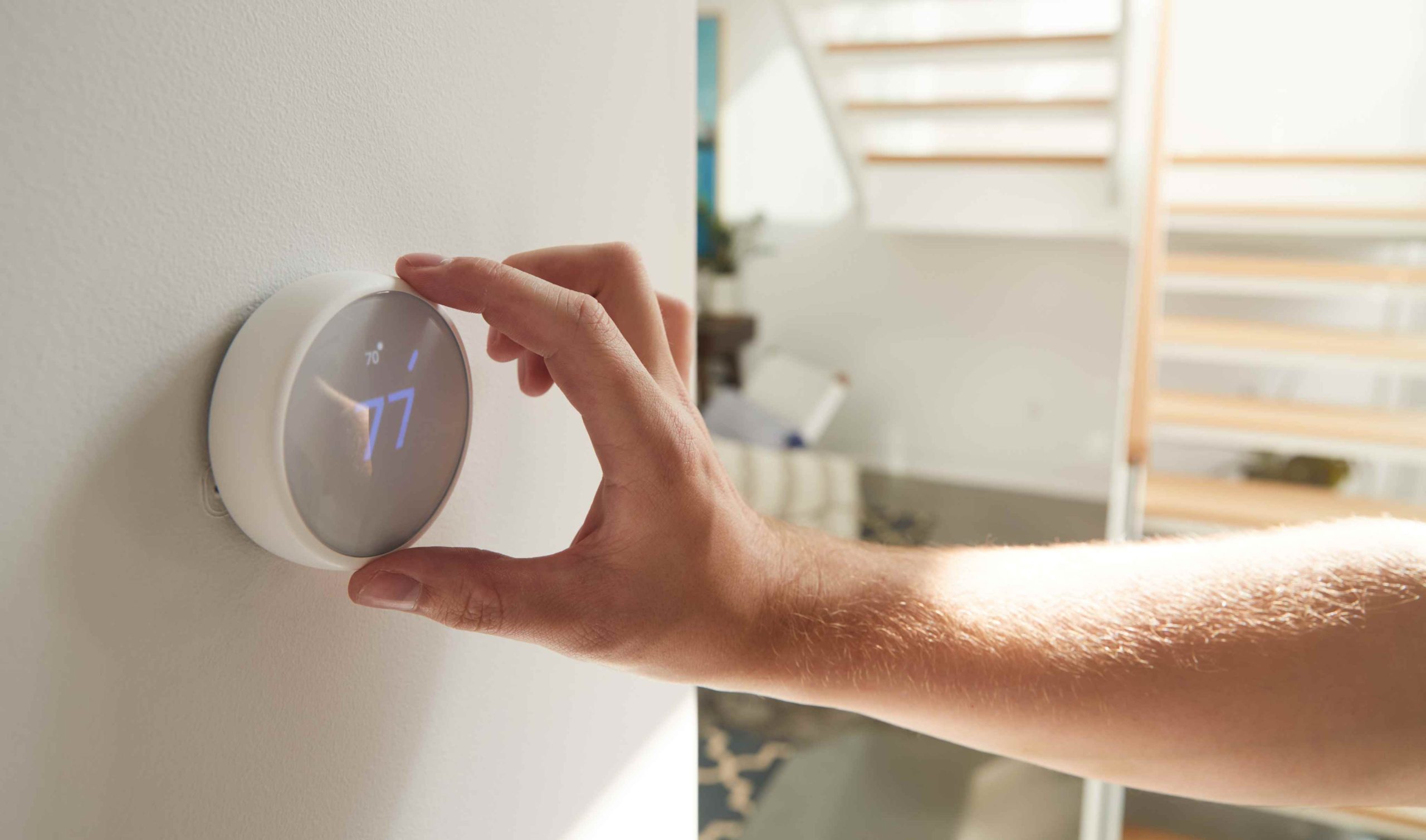 smart thermostat at 77